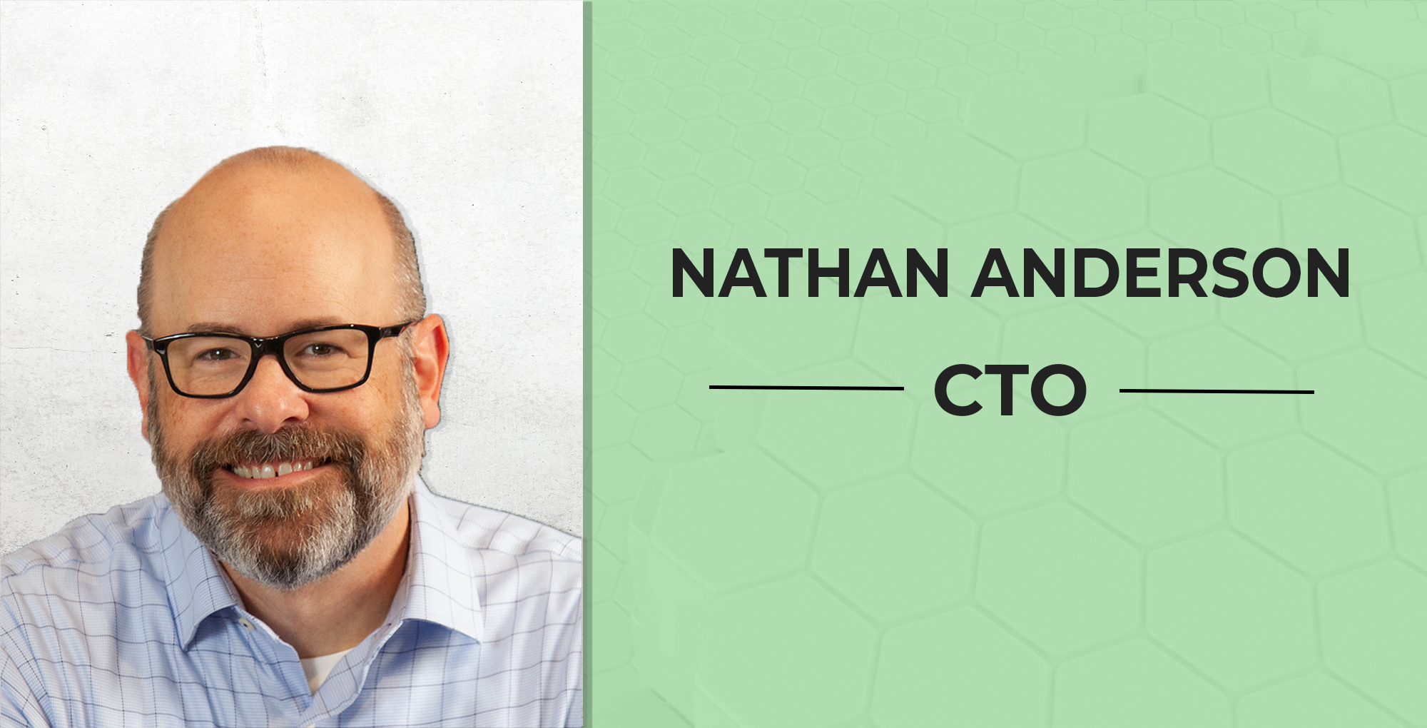 Man smiling, wearing glasses and shirt, CTO title