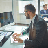 Man working on computer in office